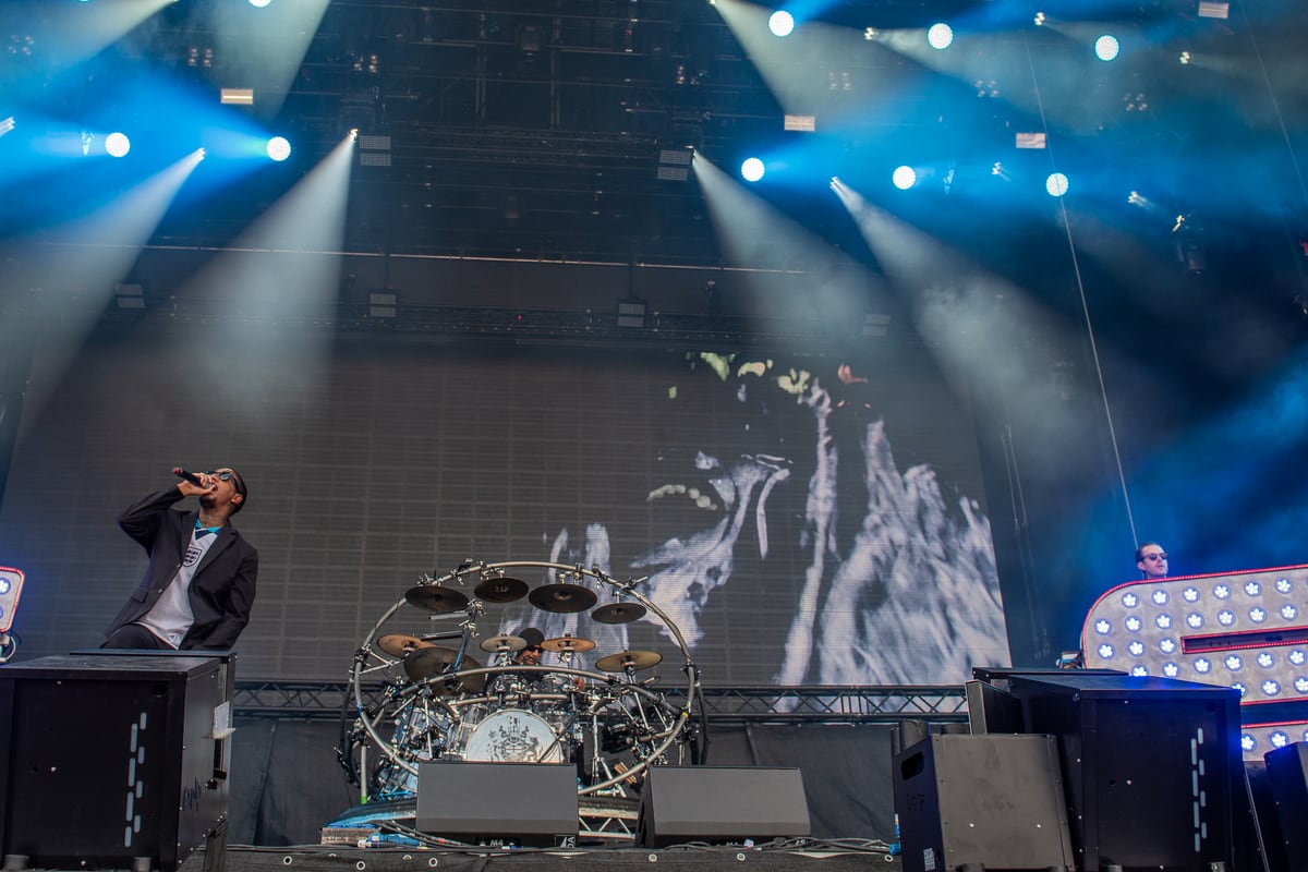 Chase and Status performing on a festival stage