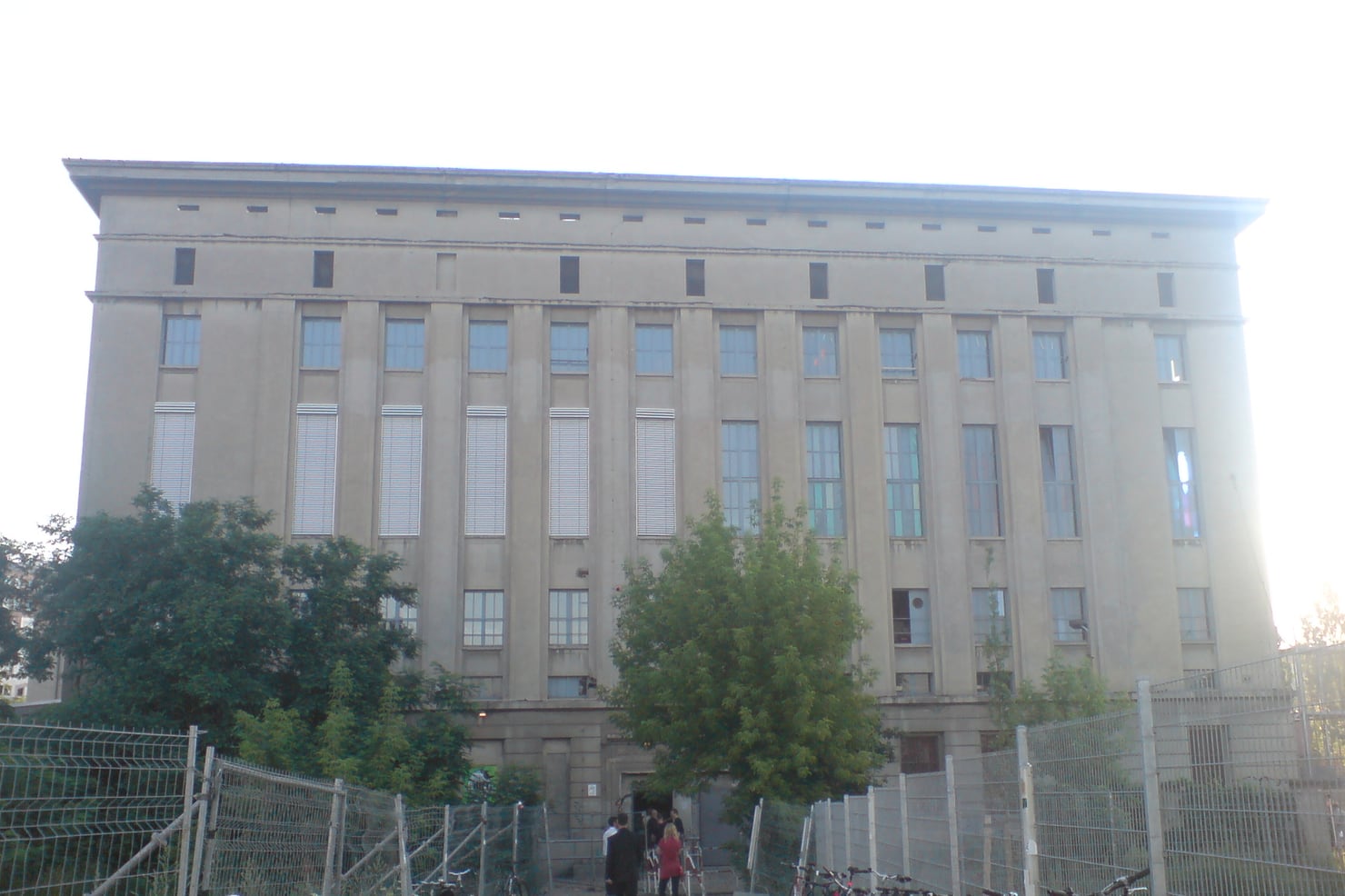 The facade of Berghain in Berlin in evening light