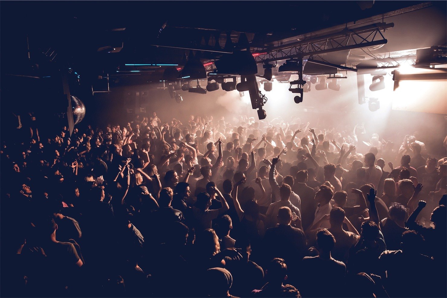 The Box at Ministry of Sound packed with a crowd under the lighting rig, hands in the air, before the 2026 refit