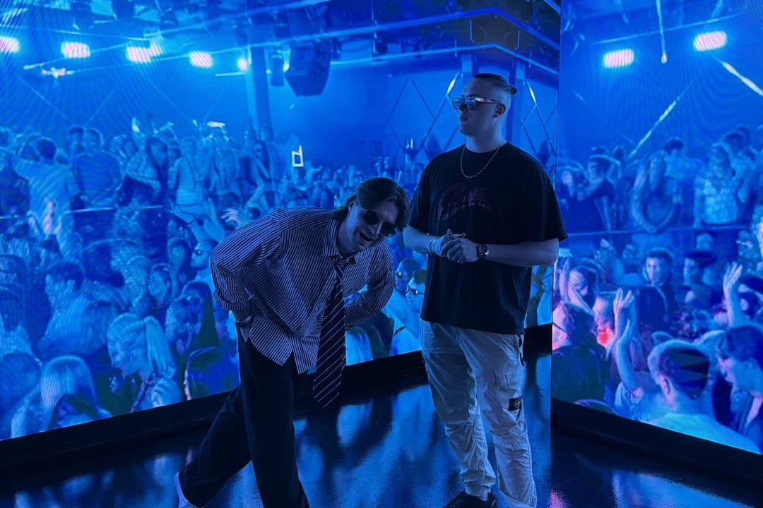 MNEEMO and CABBA LAGA above a packed dancefloor in blue light at a London UK garage night