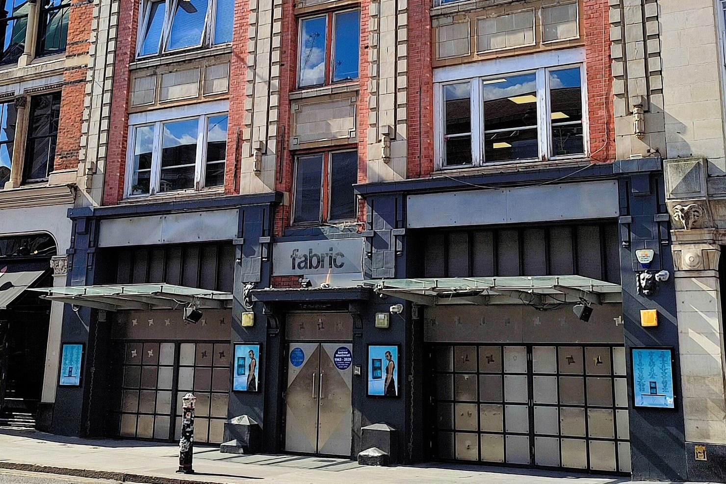 The ground floor of fabric on Charterhouse Street, Farringdon, with its steel entrance doors under the fabric sign